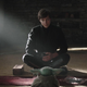 Luke sitting in front of Grogu.